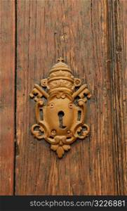 Close-up of an ornate brass keyhole on a door, Havana, Cuba
