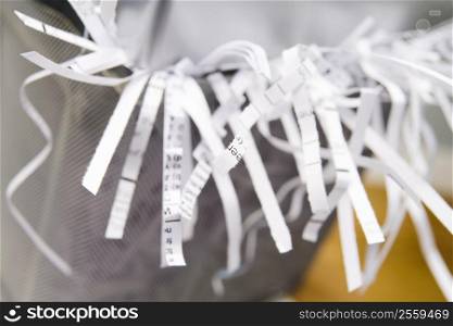 Close-Up Of An Overflowing Paper Shredder