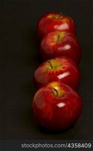 Close-up of apples in a row