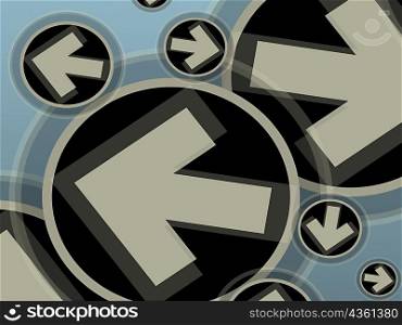 Close-up of arrow signs in circles