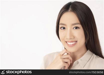 Close up of Asian woman with beautiful teeth on white background