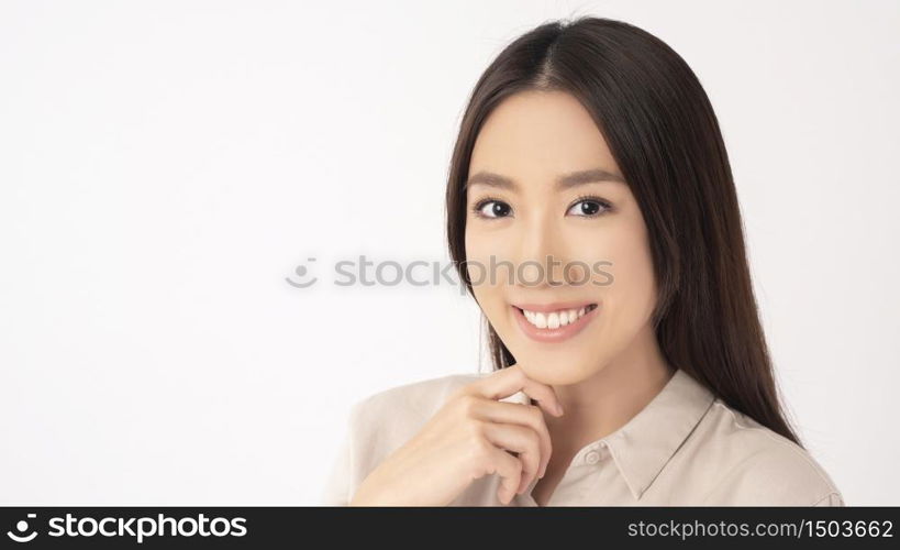 Close up of Asian woman with beautiful teeth on white background