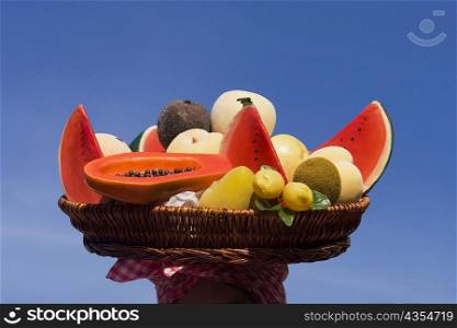 Close-up of assorted fruits in a wicker basket