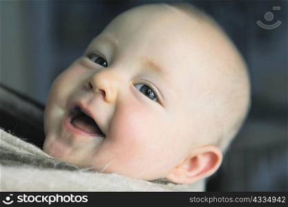 Close up of babys laughing face
