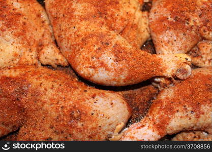 Close up of BBQ chicken with spice on it.