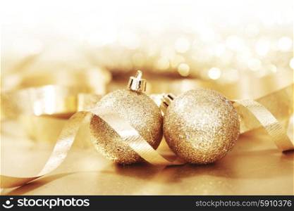 Close-up of beautiful golden glitter christmas decorative balls. Christmas balls