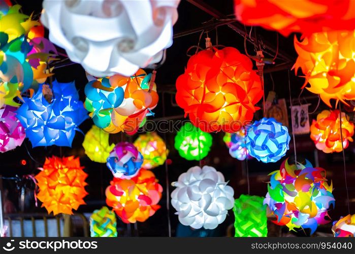Close up of Beautiful lantern lamp decorated street stalls,light bulbs in a vintage living room,colorful lantern background.