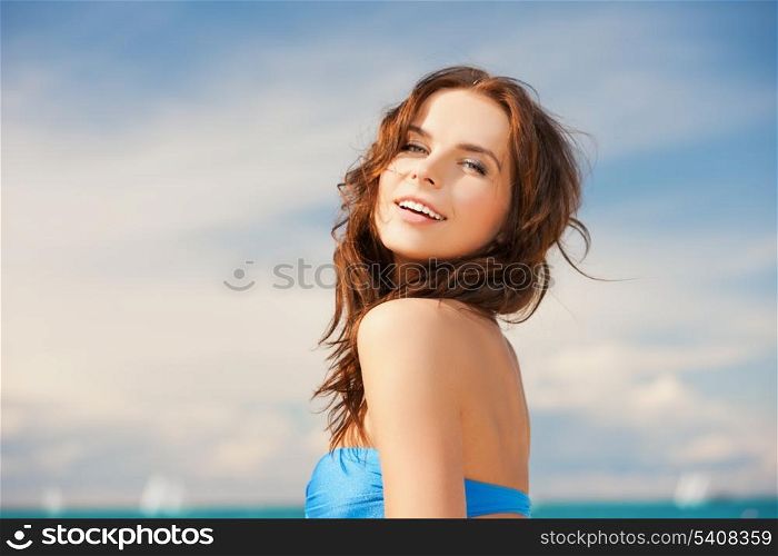 close up of beautiful woman in bikini smiling