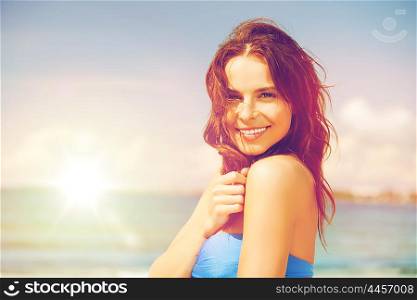 close up of beautiful woman in bikini smiling. woman in bikini smiling