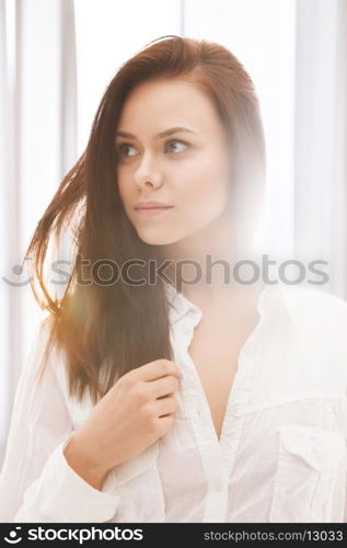 close up of beautiful woman in sunlight