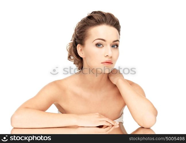 close up of beautiful woman lying on the mirror. woman with mirror