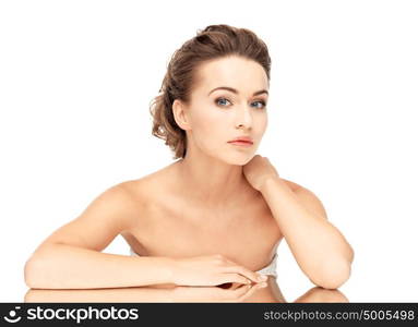 close up of beautiful woman lying on the mirror. woman with mirror