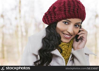 Close-up of beautiful woman talking on cell phone