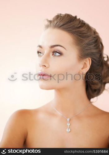 close up of beautiful woman wearing shiny diamond necklace