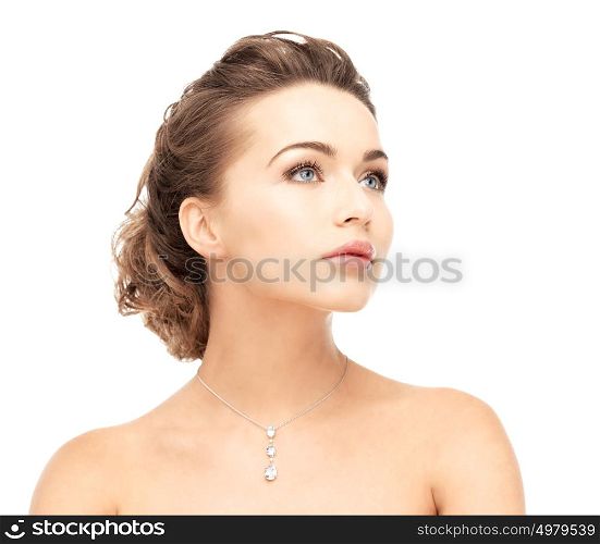 close-up of beautiful woman wearing shiny diamond necklace. woman wearing shiny diamond necklace
