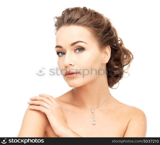 close-up of beautiful woman wearing shiny diamond necklace. woman wearing shiny diamond necklace