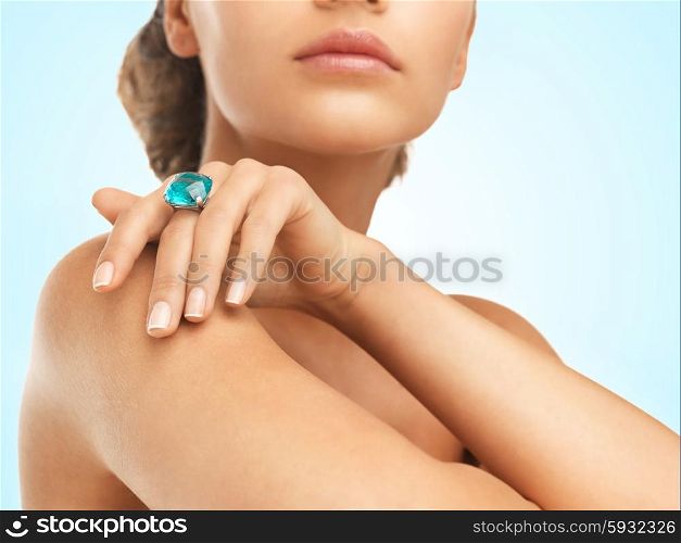 close-up of beautiful woman with cocktail ring. woman with cocktail ring