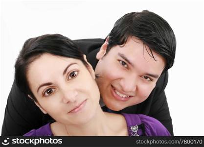 Close-up of beautiful young couple isolated on white background
