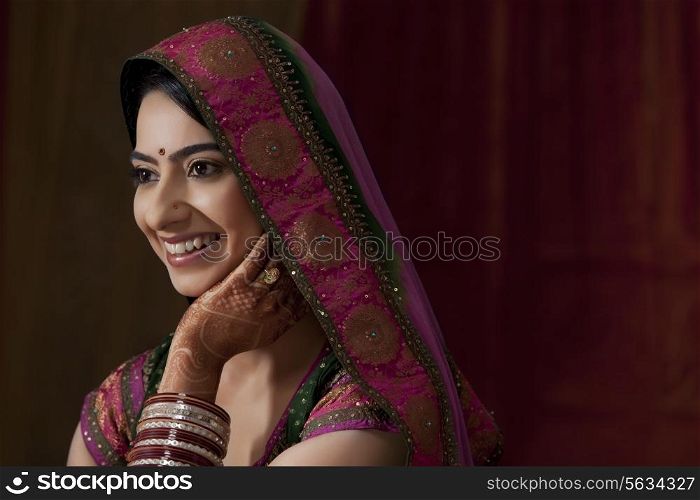 Close-up of beautiful young Indian bride