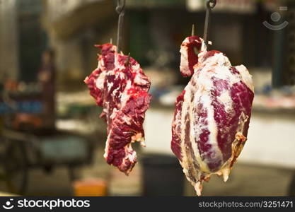 Close-up of beef hanging at a market stall, Tai&acute;an, Shandong Province, China