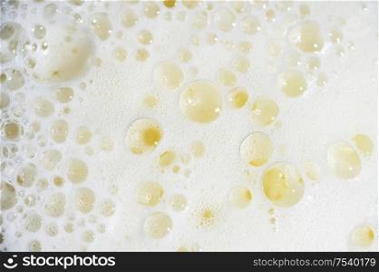 Close Up Of Beer With Foam and Bubbles