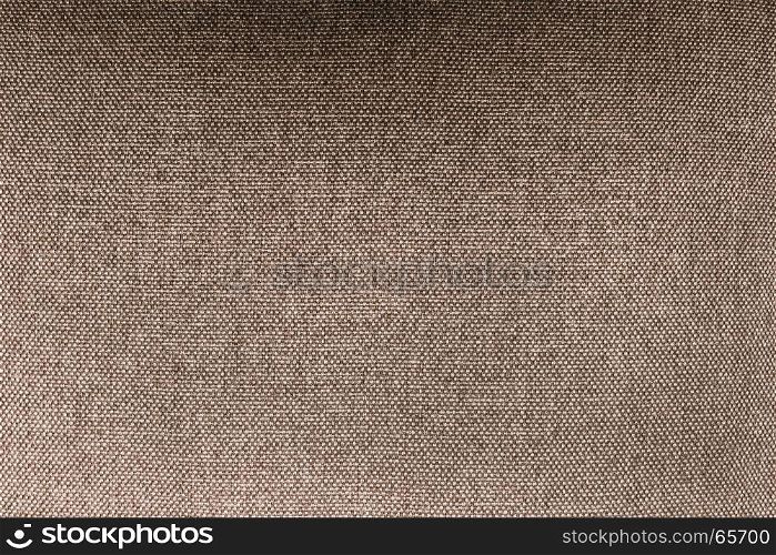 Close-up of beige fleece fabric, material texture background