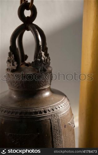 Close-up of bell hanging at Wat Phrathat Doi Suthep, Chiang Mai, Thailand