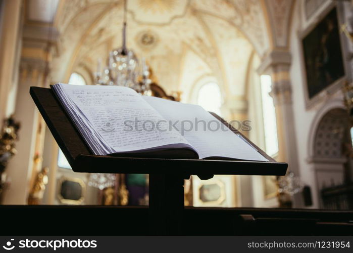 Close up of Bible or prayer book in a church