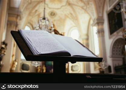 Close up of Bible or prayer book in a church