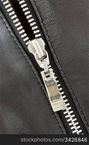 close-up of black leather jacket with metal zipper