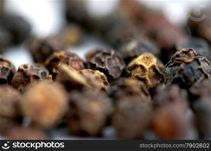 Close up of black pepper with a shallow DOF.