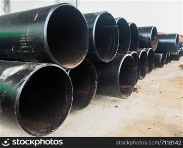 Close-up of black steel pipes for main work pipes, fire production system