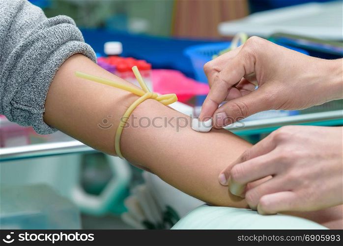 Close up of blood test preparation in hospital, healthcare concept