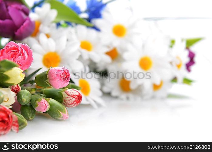 Close up of bouquet of colorful carnation and other flowers
