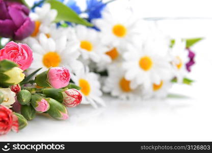 Close up of bouquet of colorful carnation and other flowers