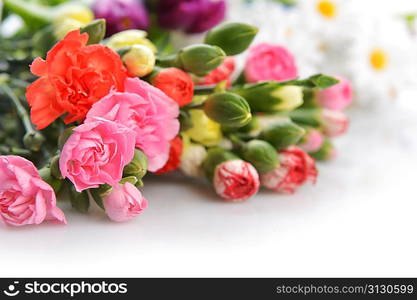 Close up of bouquet of colorful carnation and other flowers