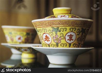 Close-up of bowls on the table