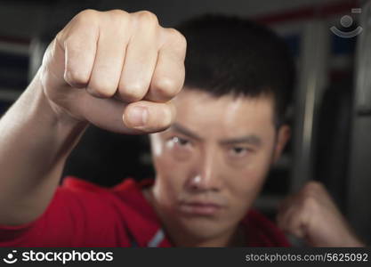 Close up of boxer throwing a punch at the camera