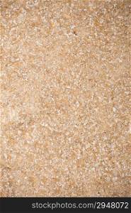 Close up of bran as beige food background or grain texture. Diet and healthy nutrition.
