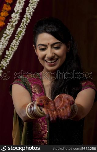 Close-up of bride&rsquo;s hand with henna tattoo