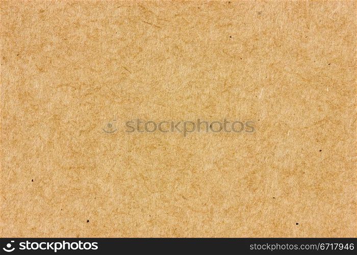 Close-up of brown cardboard. May be used as a background