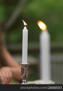 Close-up of burning candle, Lake of the Woods, Ontario, Canada