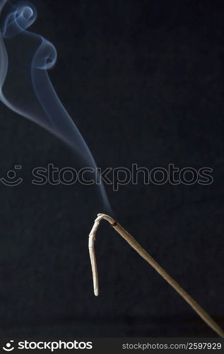 Close-up of burning incense