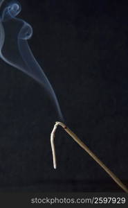 Close-up of burning incense