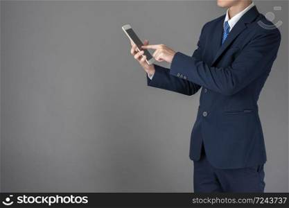 Close up of business man is using tablet