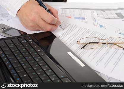Close-up of business person hands working with document