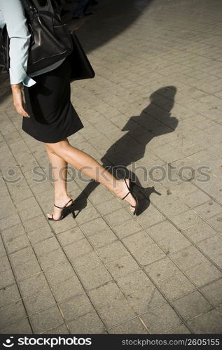 Close up of business woman walking