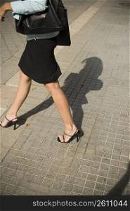 Close up of business woman walking