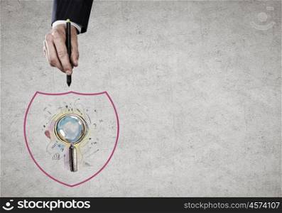Close up of businessman hand drawing search icon. Search for solution