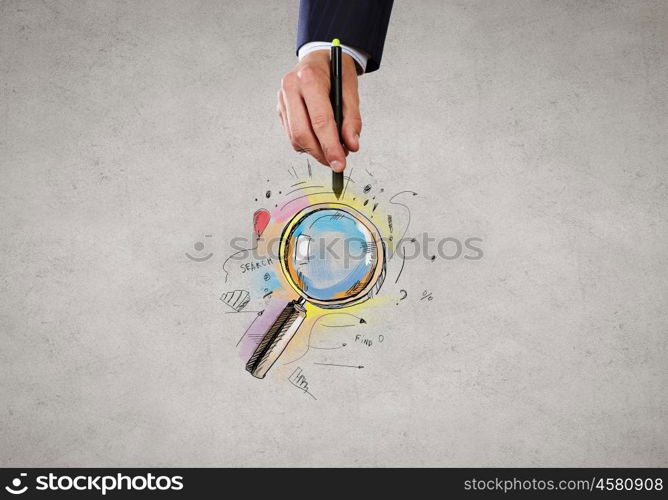 Close up of businessman hand drawing search icon. Search for solution